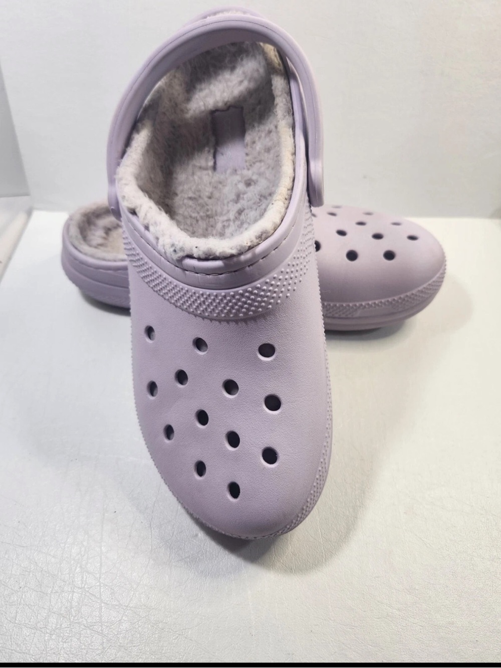 Crocs Classic Lined Clogs in a lavender or purple color W/7